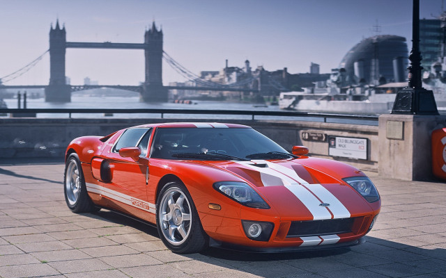 Red sports car bridge tower free wallpaper for desktop - medium preview image