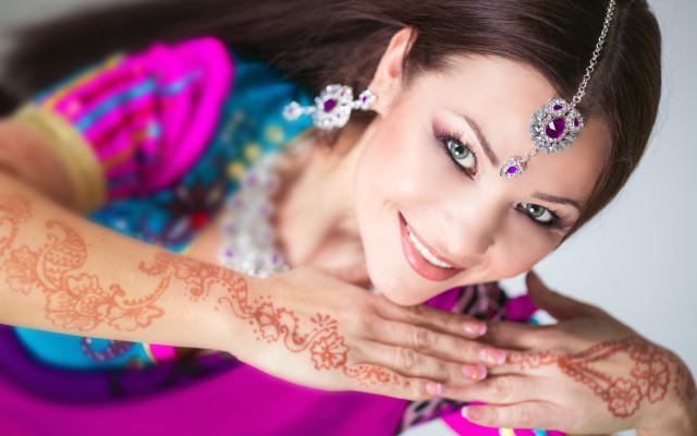 Woman henna arm tattoo smile free wallpaper for desktop - medium preview image