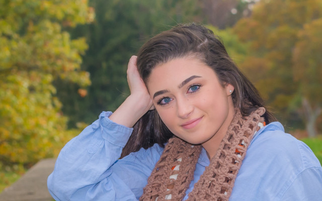 Woman blue shirt brown scarf free wallpaper for desktop - medium preview image