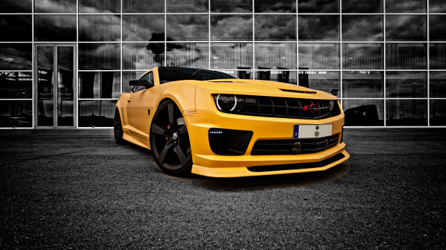 Yellow sports car building cloudy free wallpaper for desktop - medium preview image