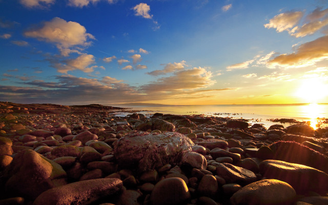 Rocky beach sunset clouds water free wallpaper for desktop - medium preview image