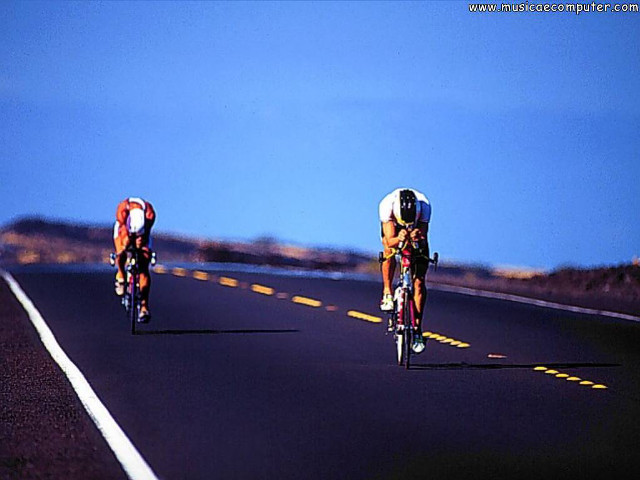 Two men biking sunny day free wallpaper for desktop - medium preview image