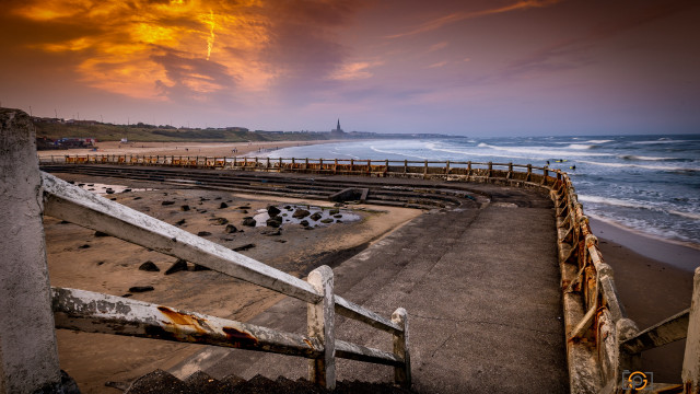 Dusk beach fence lighthouse water free wallpaper for desktop - medium preview image