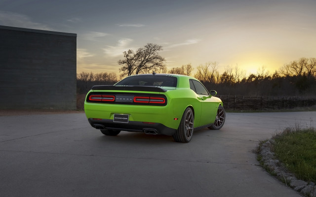 Green sports car driveway sunset free wallpaper for desktop - medium preview image