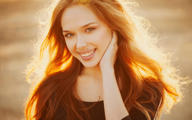 Woman smiling longhair portrait fire free wallpaper for desktop - medium preview image