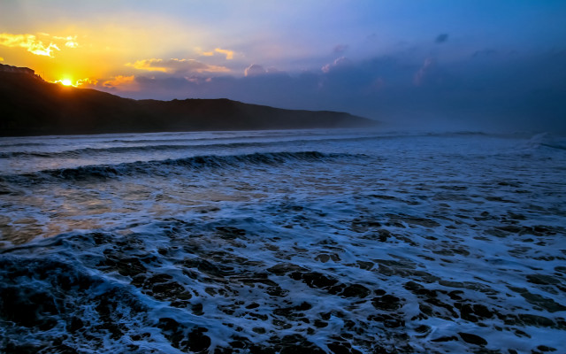 Sunset mountains ocean waves citylights free wallpaper for desktop - medium preview image