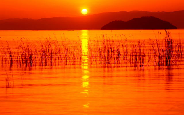 Sunset water boat mountain orange free wallpaper for desktop - medium preview image