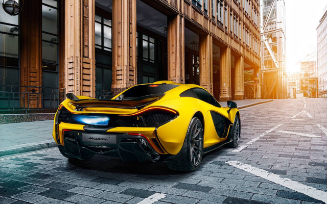 Yellow sports car city street free wallpaper for desktop - medium preview image