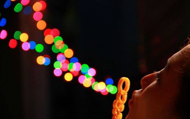 Young girl blowing out lights free wallpaper for desktop - medium preview image