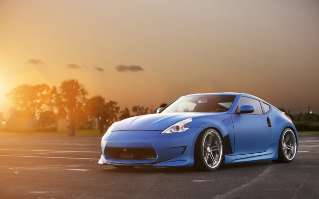 Blue sports car sunset 3d free wallpaper for desktop - medium preview image