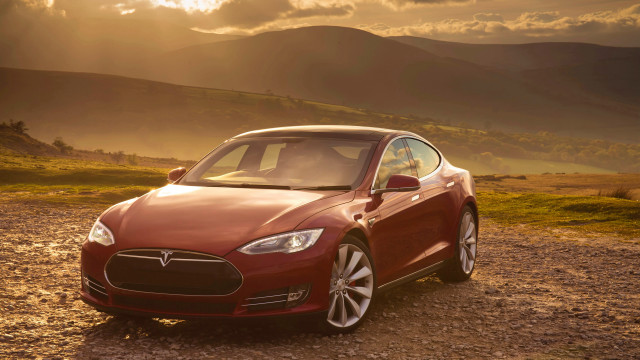 Red car mountains sunset dirt free wallpaper for desktop - medium preview image