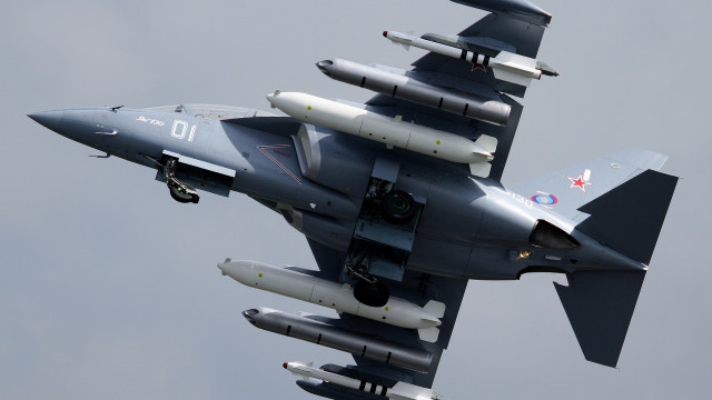 Fighterjet cloudy sky landinggear pilot free wallpaper for desktop - medium preview image