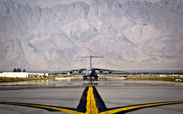 Airplane runway mountains yellow line #2 free wallpaper for desktop - medium preview image