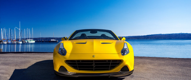 Yellow sports car beach water free wallpaper for desktop - medium preview image
