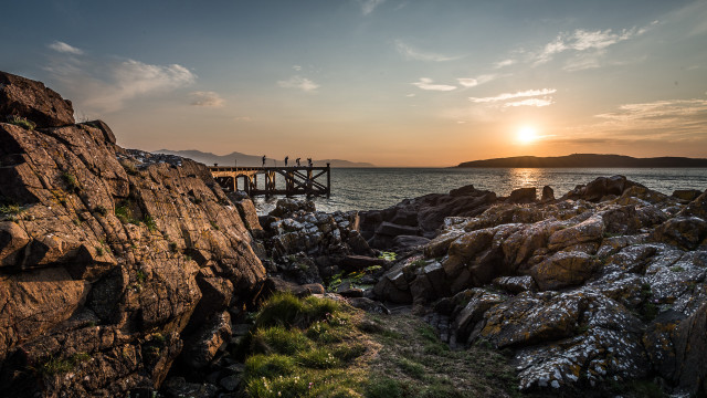Wooden bridge sunset rocky shore free wallpaper for desktop - medium preview image