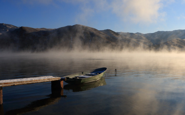 Boat docked lake mountains foggy free wallpaper for desktop - medium preview image