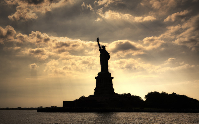 Liberty silhouette cloudy sky water #2 free wallpaper for desktop - medium preview image
