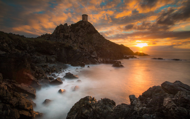 Lighthouse rocky cliff sunset ocean #2 free wallpaper for desktop - medium preview image