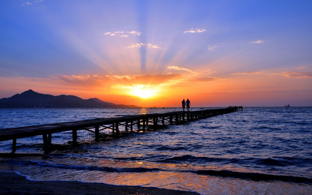 Pier sunset ocean mountain boat free wallpaper for desktop - medium preview image