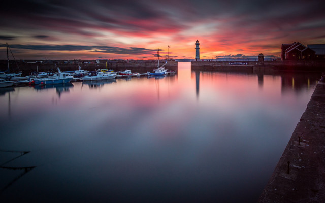 Harbor boats lighthouse sunset cloudy free wallpaper for desktop - medium preview image
