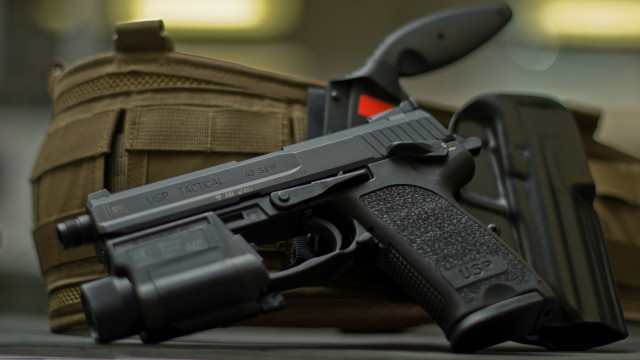 Gun luggage backpack tiltshift precisionism free wallpaper for desktop - medium preview image