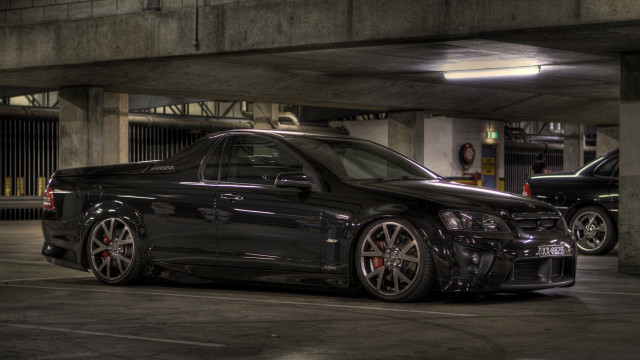 Black car parking garage clock free wallpaper for desktop - medium preview image