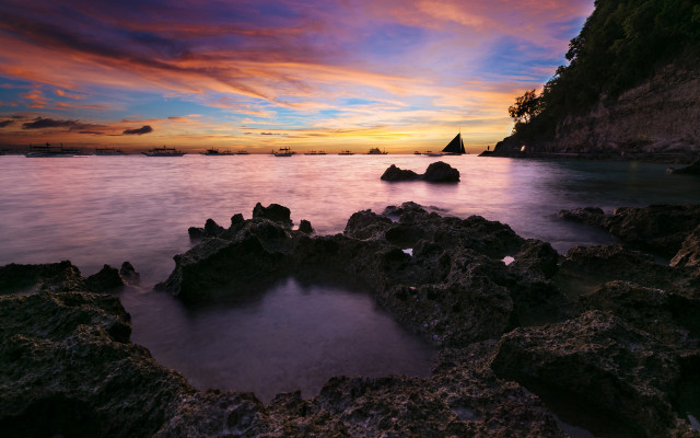 Sunset rocky beach cityscape mountains free wallpaper for desktop - medium preview image
