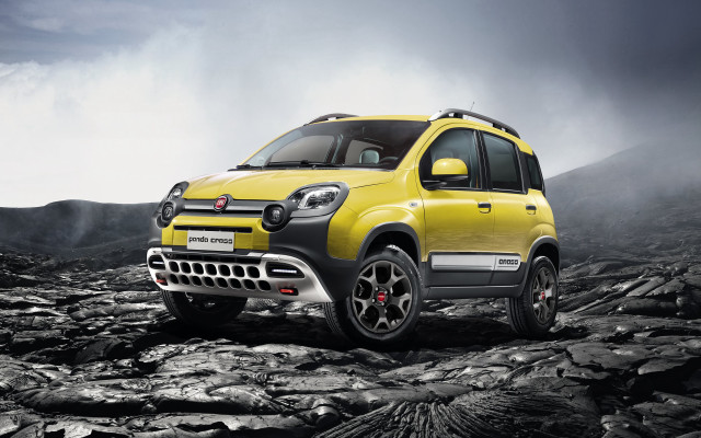 Yellow car rocky mountains clouds free wallpaper for desktop - medium preview image