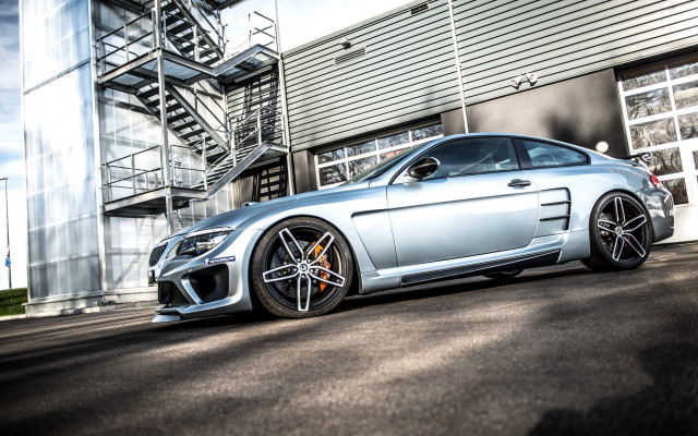 Silver sports car spiral staircase free wallpaper for desktop - medium preview image