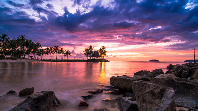 Sunset tropical beach palm rocks free wallpaper for desktop - medium preview image