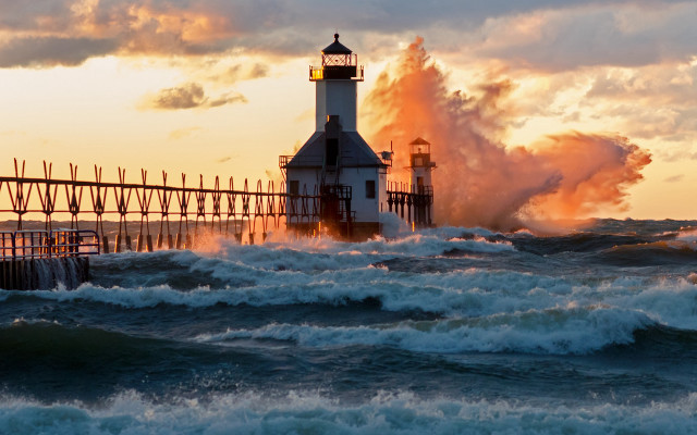 Lighthouse waves ocean sunset cloudy free wallpaper for desktop - medium preview image