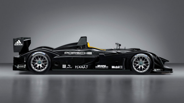 Racecar yellow stripe black background free wallpaper for desktop - medium preview image