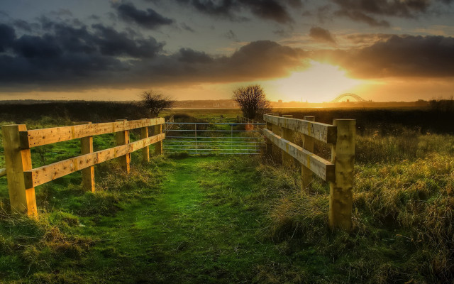 Fence grassfield sunset cloudy sky free wallpaper for desktop - medium preview image