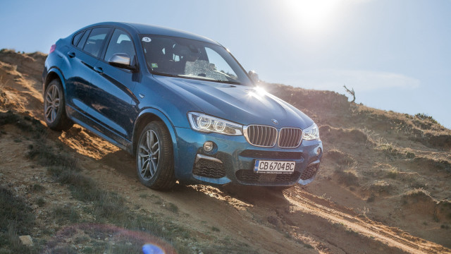 Blue bmw suv dirt road free wallpaper for desktop - medium preview image