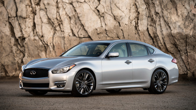 Silver car rock wall detailed free wallpaper for desktop - medium preview image