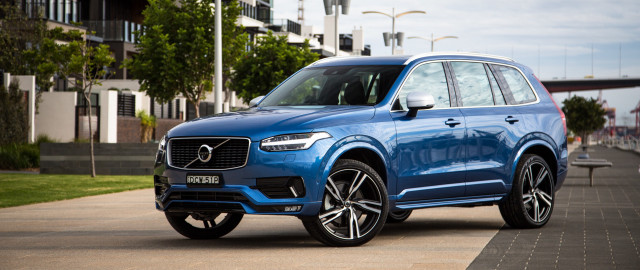 Blue volvo suv city street #2 free wallpaper for desktop - medium preview image