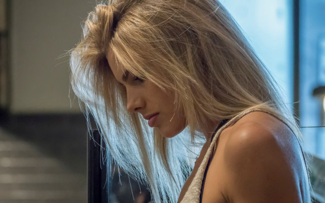 Blonde woman cellphone hallway stairs free wallpaper for desktop - medium preview image