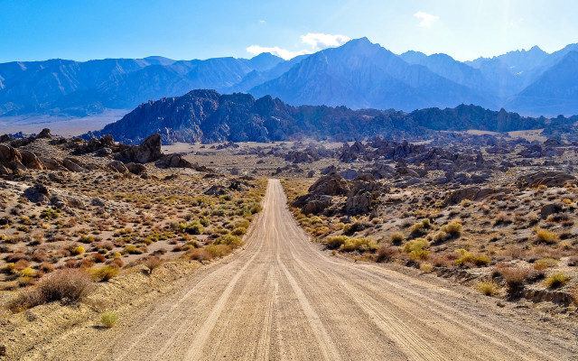 Desert dirt road mountains clouds free wallpaper for desktop - medium preview image