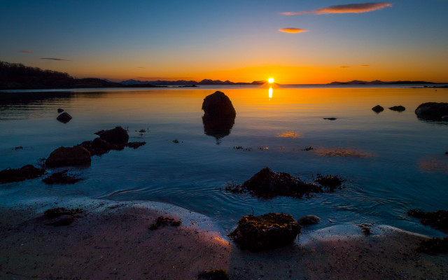 Sunset water rocks clouds lighthouse free wallpaper for desktop - medium preview image
