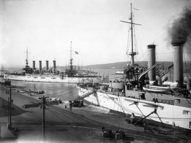 Large ship docked harbor smoke free wallpaper for desktop - medium preview image