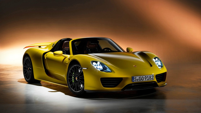 Yellow sports car spotlight dark free wallpaper for desktop - medium preview image