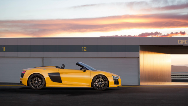 Yellow sports car garage sunset free wallpaper for desktop - medium preview image