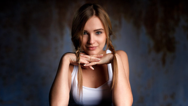 Woman braid portrait rusty background free wallpaper for desktop - medium preview image