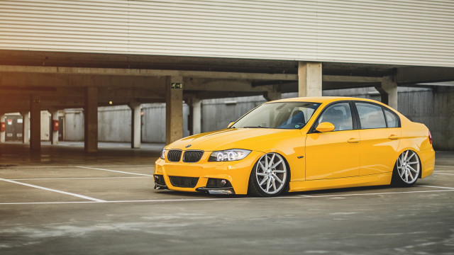 Yellow car parking lot building #2 free wallpaper for desktop - medium preview image