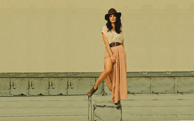 Woman hat dress ledge suitcase free wallpaper for desktop - medium preview image