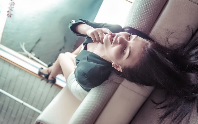 Woman laying couch mirror blurry free wallpaper for desktop - medium preview image