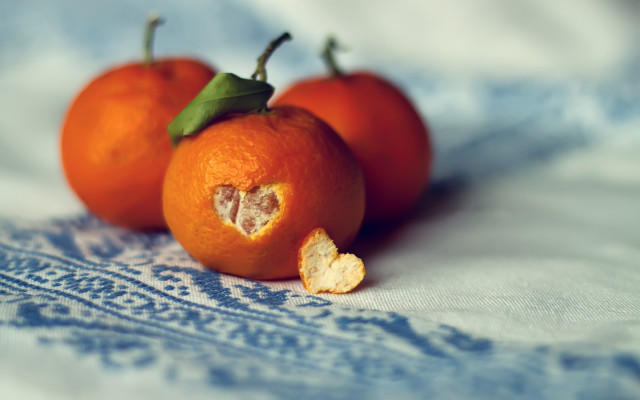 Three oranges bite blue white free wallpaper for desktop - medium preview image