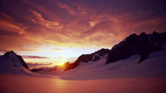 Sunset mountain snow clouds distant free wallpaper for desktop - medium preview image