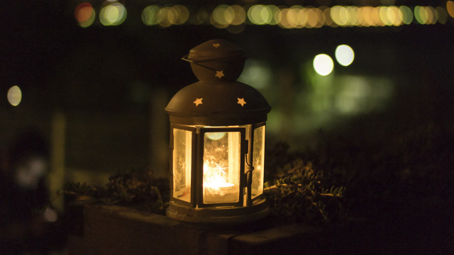 Lit lantern cement block night free wallpaper for desktop - medium preview image