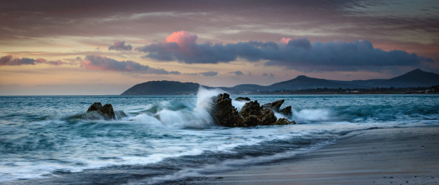 Wave rock beach sunset mountains free wallpaper for desktop - medium preview image